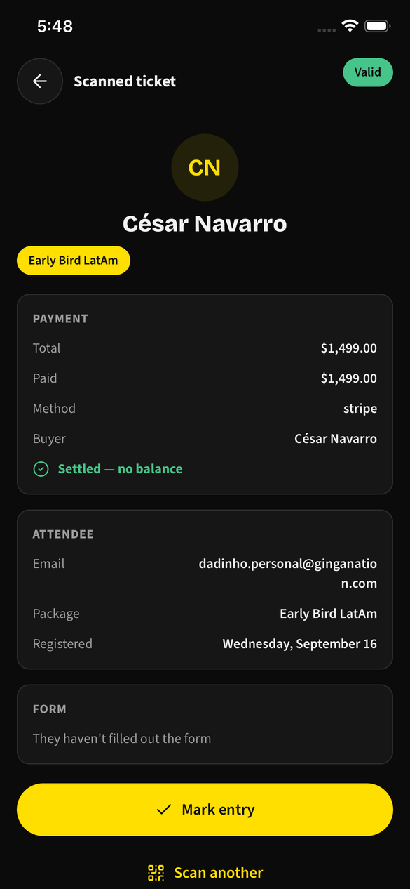 A scanned ticket: the attendee's name, the Valid badge, and the Mark entry button