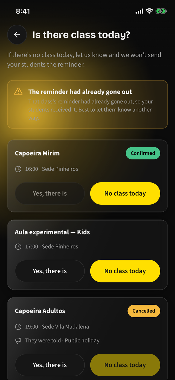 The warning banner shown when a class is cancelled after its reminder already went out, above a card now badged Cancelled
